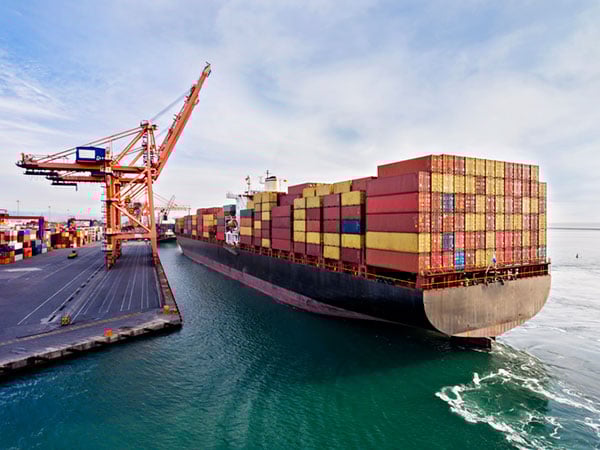 Once arriving at port, container vessels are offloaded by ship-to-shore (STS) cranes. (Photo: bfk92/E+/Getty Images)
