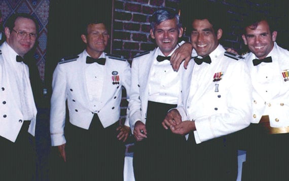 Some of the JPO Heroes at a Dining In. From left, Major Mel Birnbaum (made many important contributions. He was famous for marathon code reviews that could last 18 hours straight. He hated to miss schedules!); Col. Don Henderson (later Maj. Gen.), second Air Force Deputy; Major Ralph Tourino (later Maj. Gen.), Program Control; Lt. Col. Ken Juvette, director of procurement; and Lt. Cdr. Joe Strada, a key leader in the extensive test program. (Credit: Bradford W. Parkinson and Stephen T. Powers)