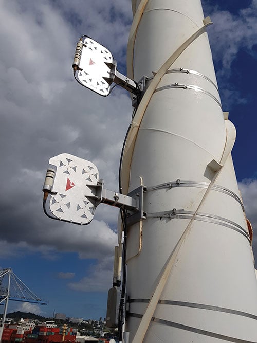 Two LocataLite transmitter antennas, installed 23 meters up a light pole, provide high-accuracy positioning coverage over part of the Ports of Auckland. (photo: Photo: David Small/Locata)